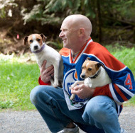 manholdingdogs.JPG
